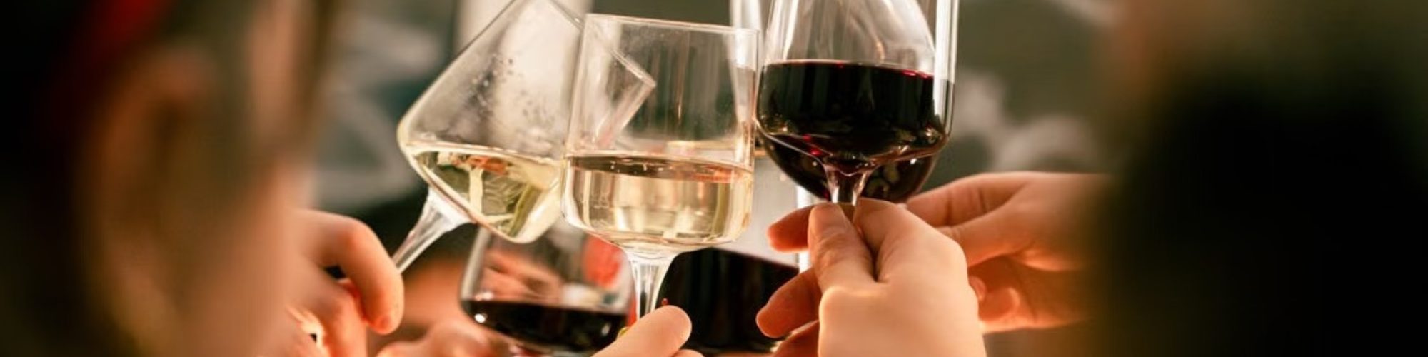 Guests Toasting With Glasses Of Wine